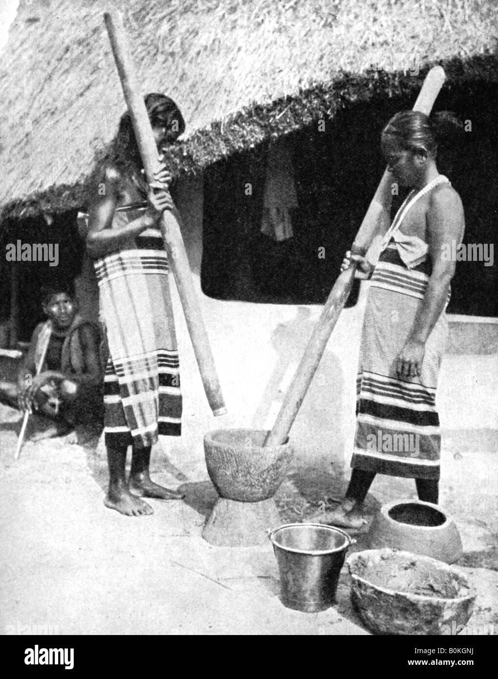 Mortar pestle village woman Black and White Stock Photos & Images Alamy