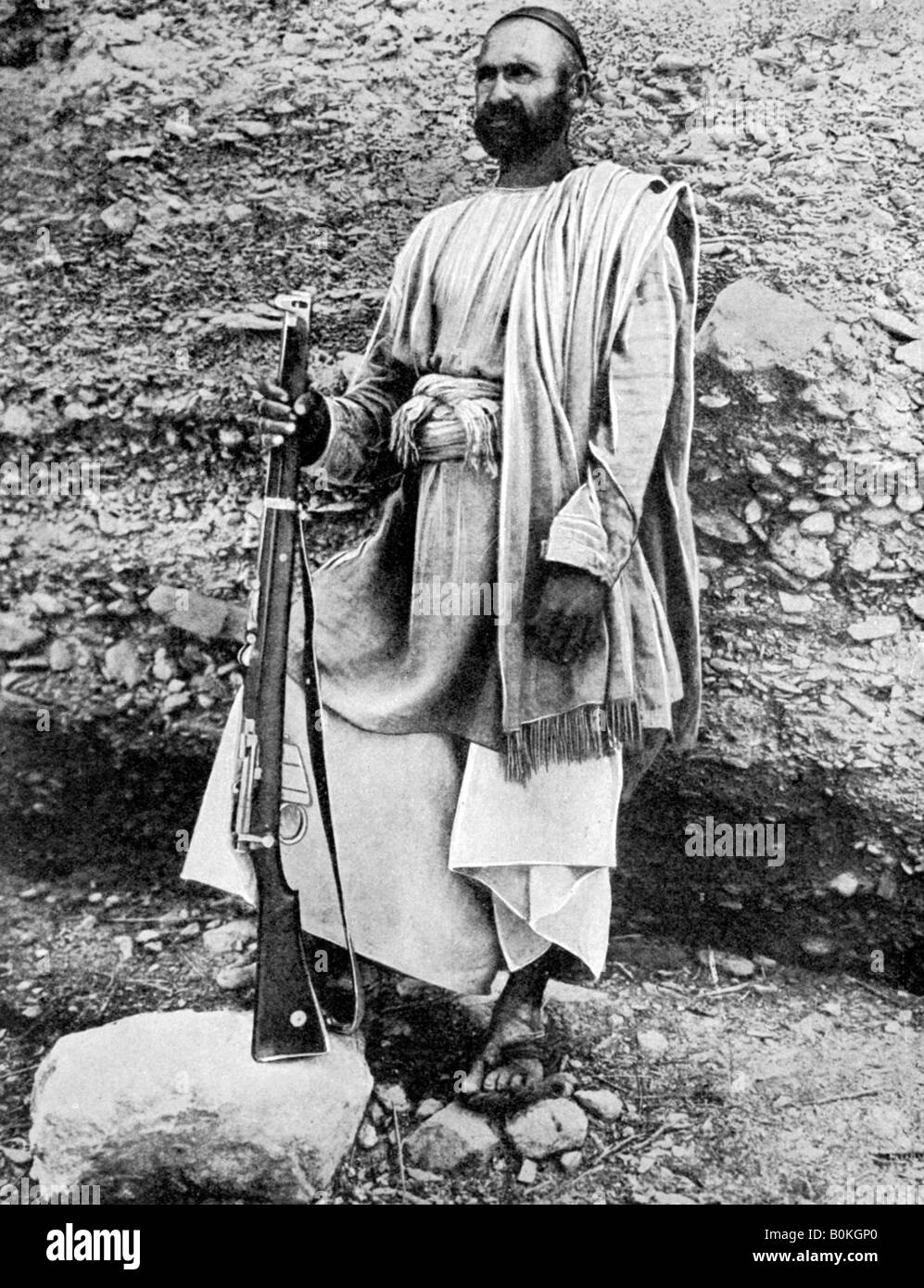 Afghan tribesman, 1936.Artist: Fox Stock Photo