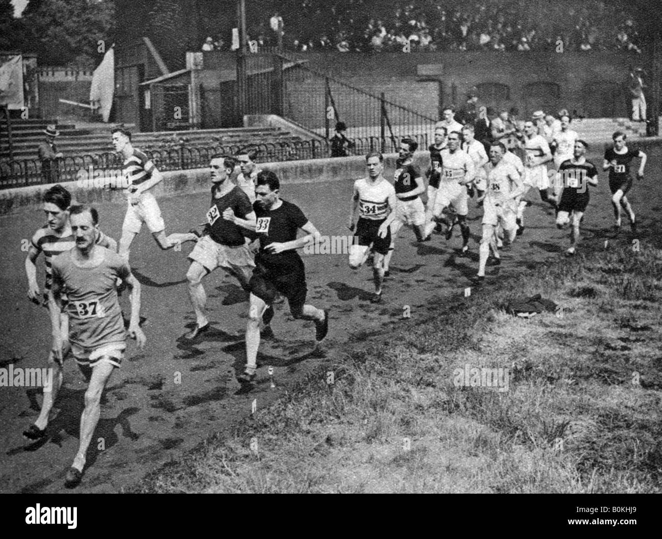 Running the half mile at the Civil Service Sports day, Stamford Bridge, London, 1926-1927. Artist: Unknown Stock Photo