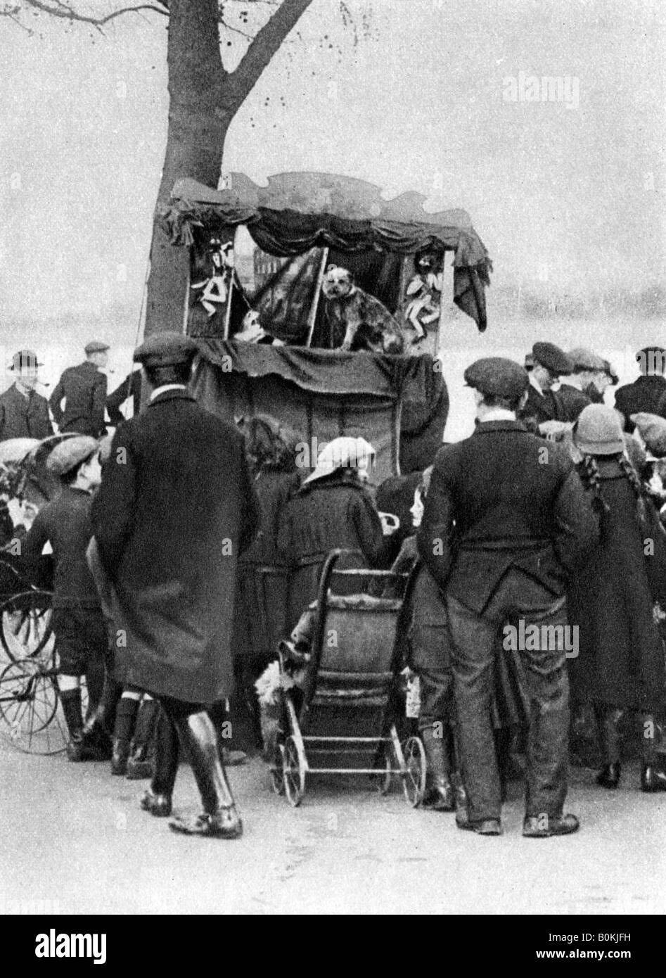 Punch and Judy show in Putney, London, 19261927. Artist Unknown Stock