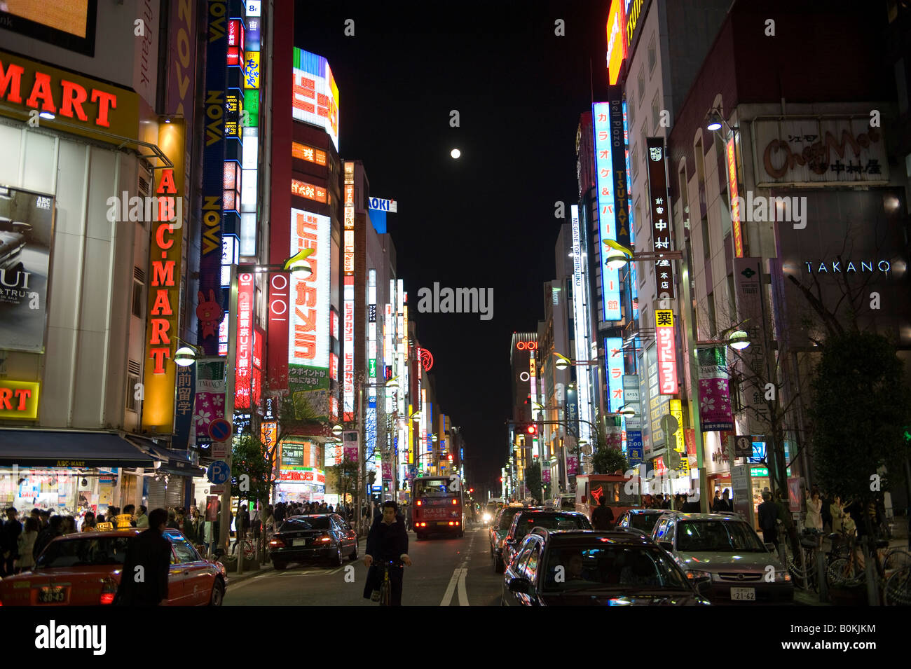 Tokyo, Japan. Neon lights in Shinjuku, with a full moon. The opening sequence of the movie 'Lost in Translation' was set here. Stock Photo