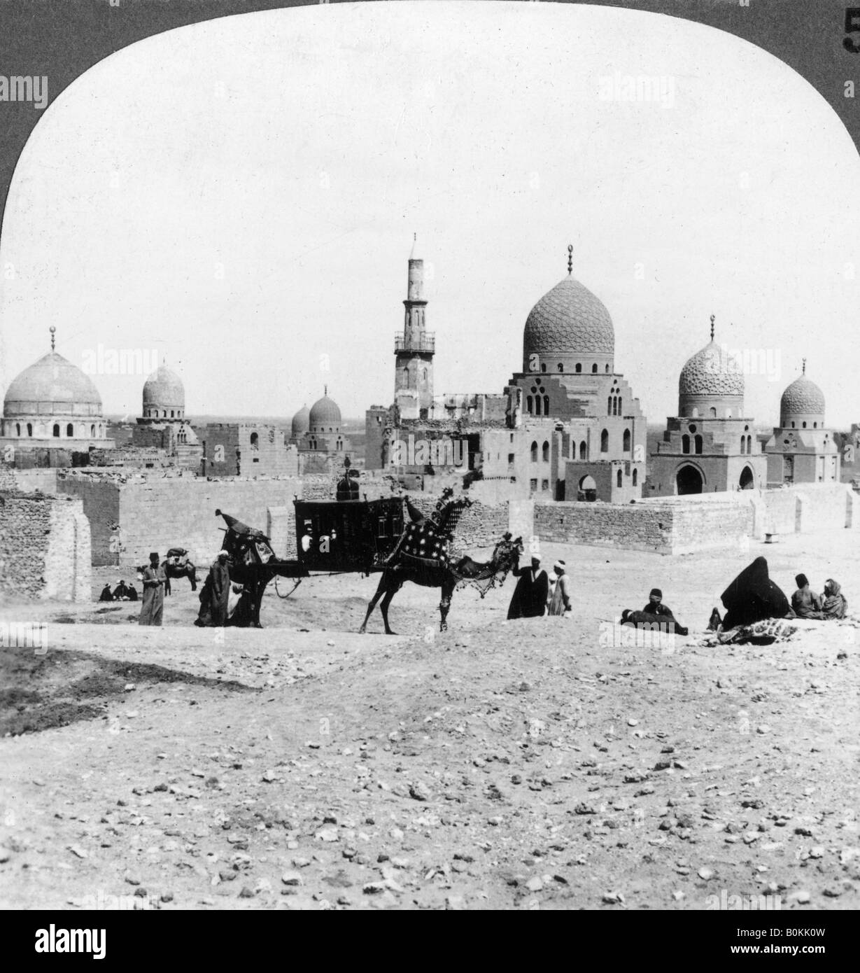 'A 'Ship of the Desert' passing tombs of by-gone Moslem rulers, Cairo, Egypt', 1905.Artist: Underwood & Underwood Stock Photo