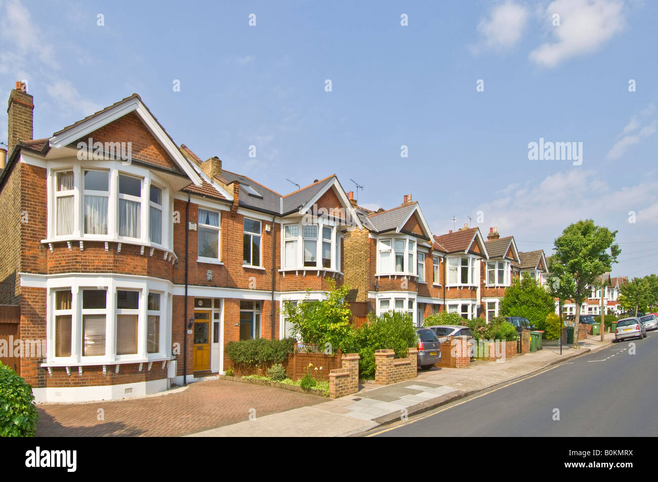 A row of typical 3 bed semi detached Victorian/Edwardian houses in suburbia. Stock Photo