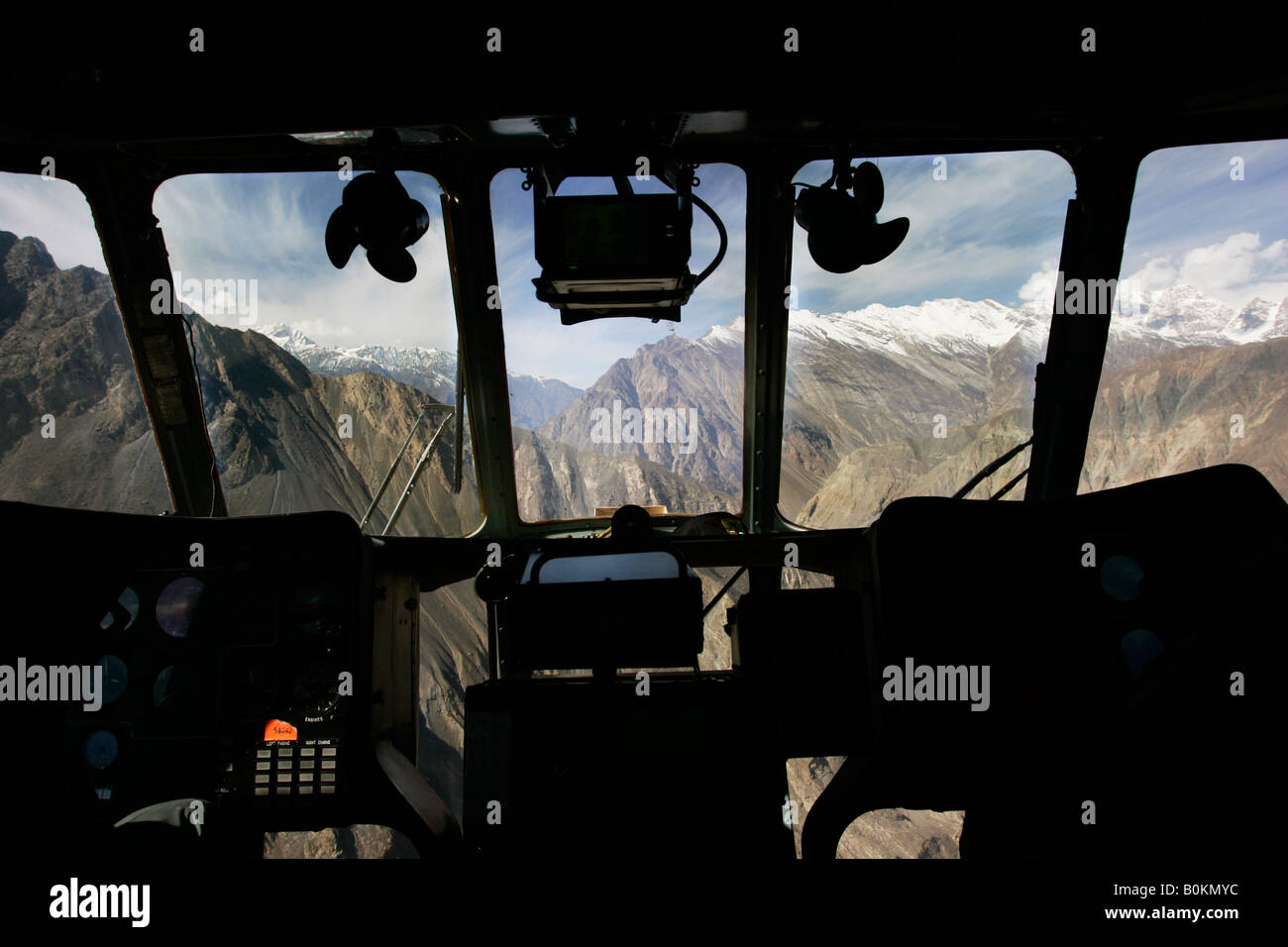 Peaks of Karokoram Mountains from helicopter cockpit Skardu Valley North Pakistan Stock Photo