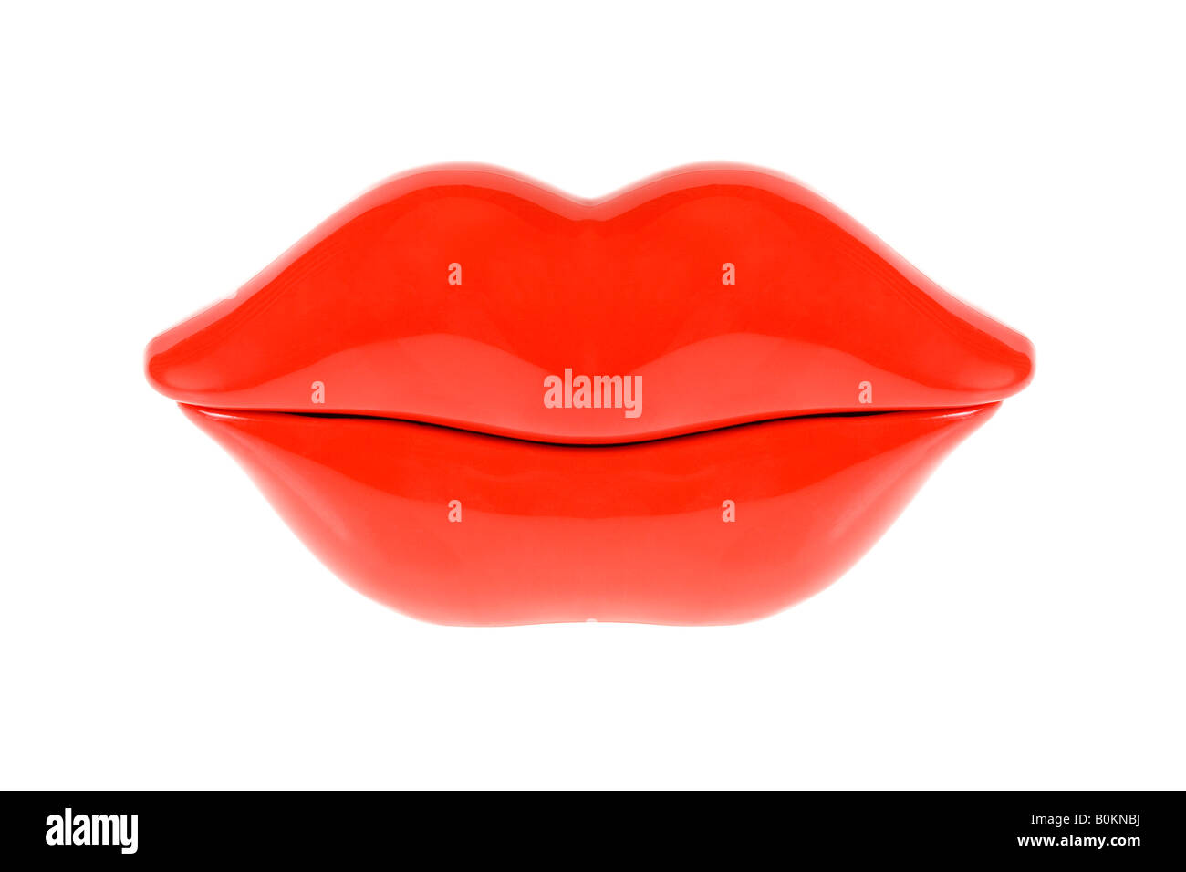 Shiny red lips on a pure white background. Stock Photo