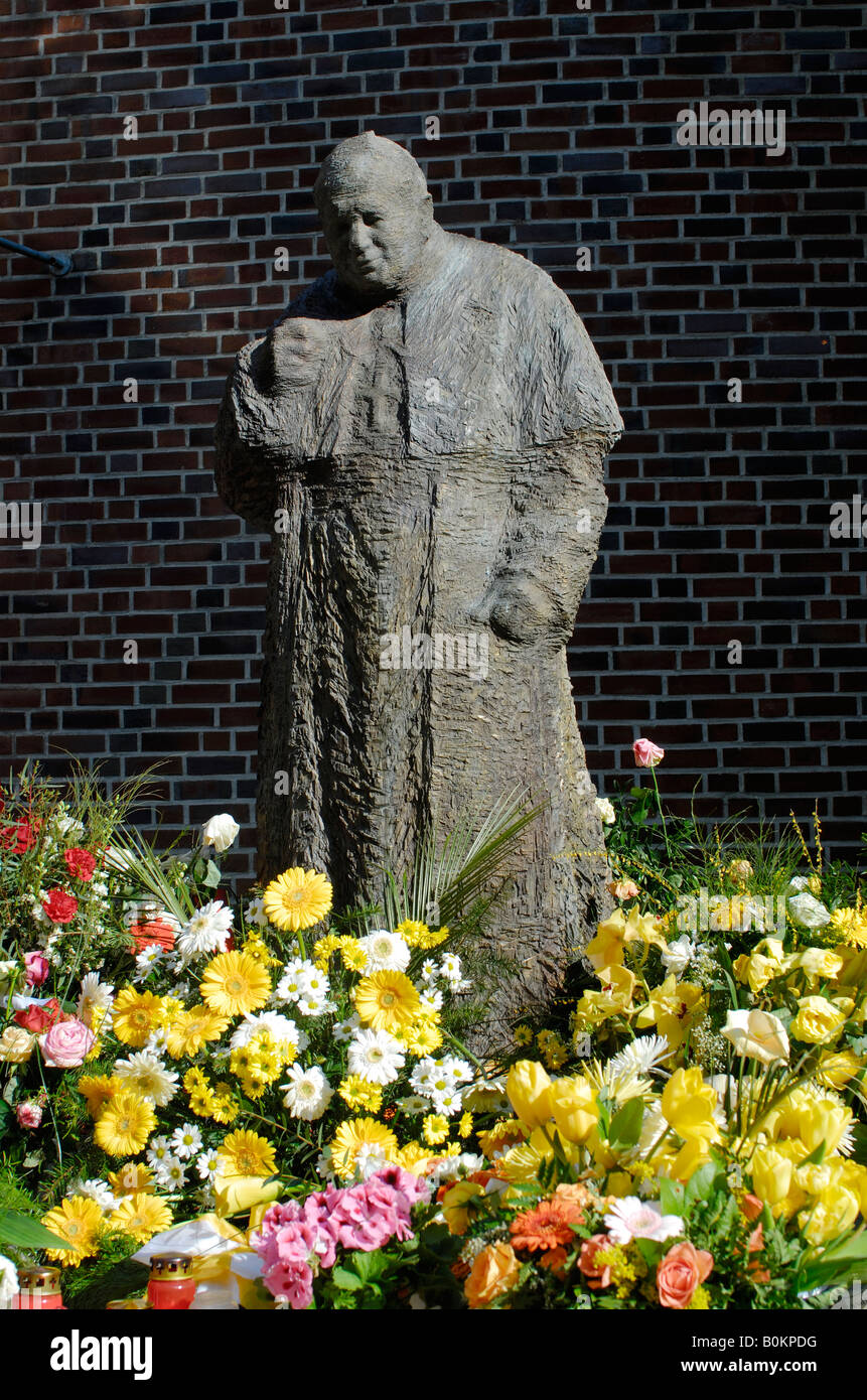 A statue of the pop Johannes Paul II. of the artist Jozek Nowak at the Domkirche St. Marien in the district St. Georg in Hamburg Stock Photo