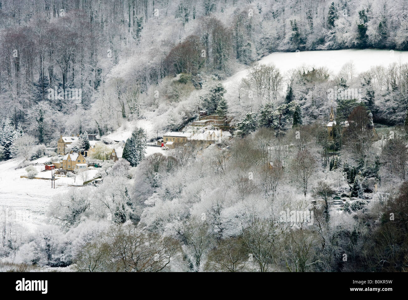 Late winter snow on the Cotswold village of Slad, Gloucestershire UK - the childhood home of Laurie Lee Stock Photo