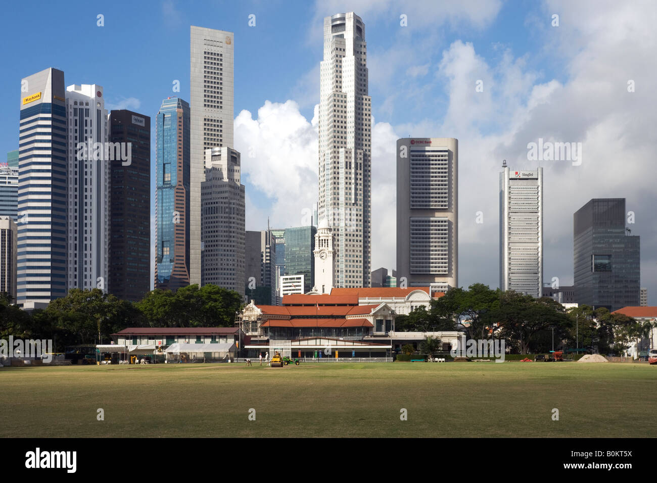 View from the Padang of the Singapore Cricket Club and the Skyscrapers of the Singapore Central Business District Stock Photo
