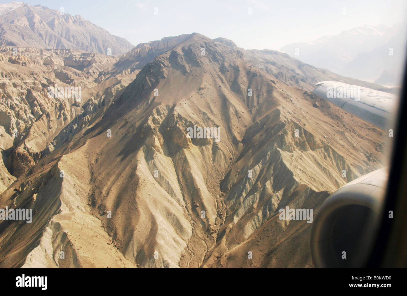 Peaks of Karokoram Mountains seen from aircraft window Skardu Valley North Pakistan Stock Photo