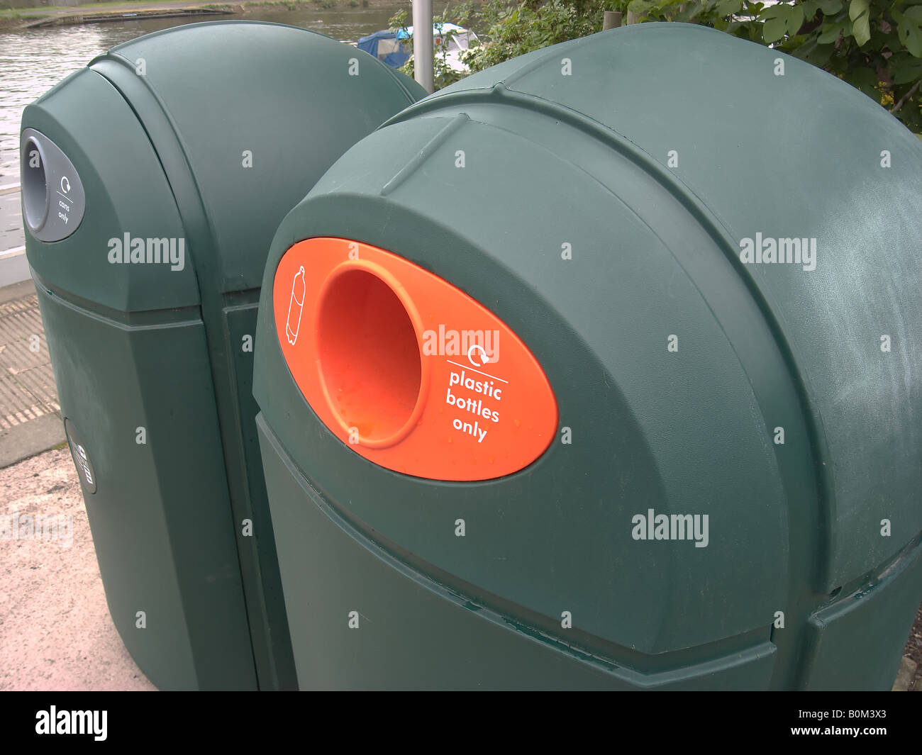 A pair of green Kingston Council recycling bins Bottle bin in the