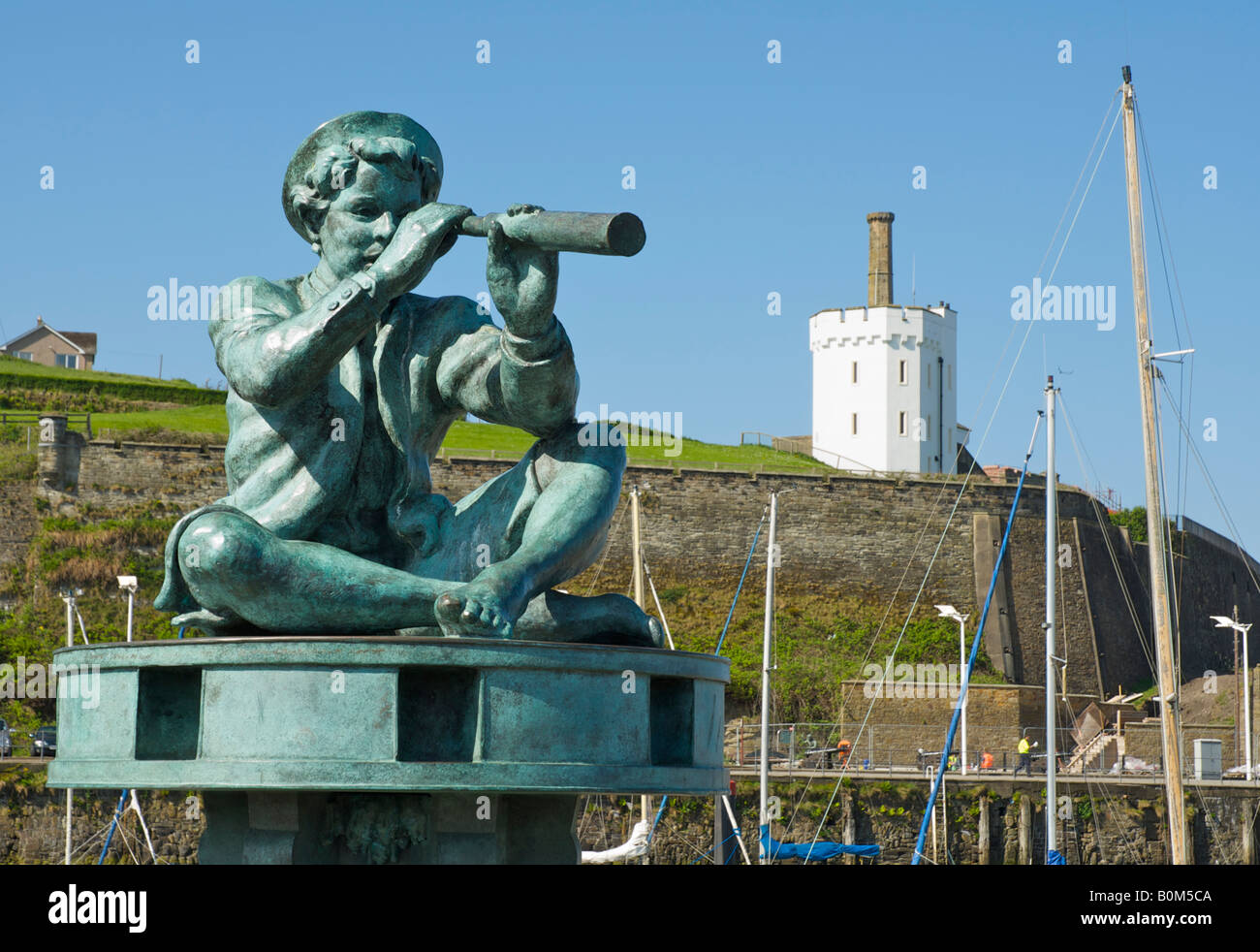 Statue of boy with telescope, Whitehaven harbour, Cumbria, England UK