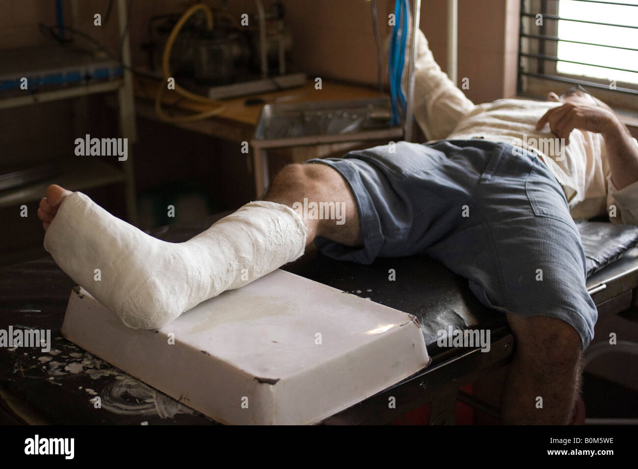 Traveler With Broken Leg In Hospital In Hospet India He Is Laying On A