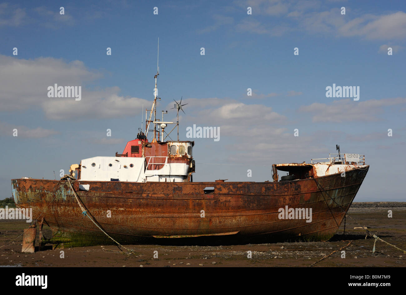 'Vita Nova', beached. derelict, fishing boat. Rampside , Morecambe Bay , Cumbria , England , U . K . , Europe . Stock Photo