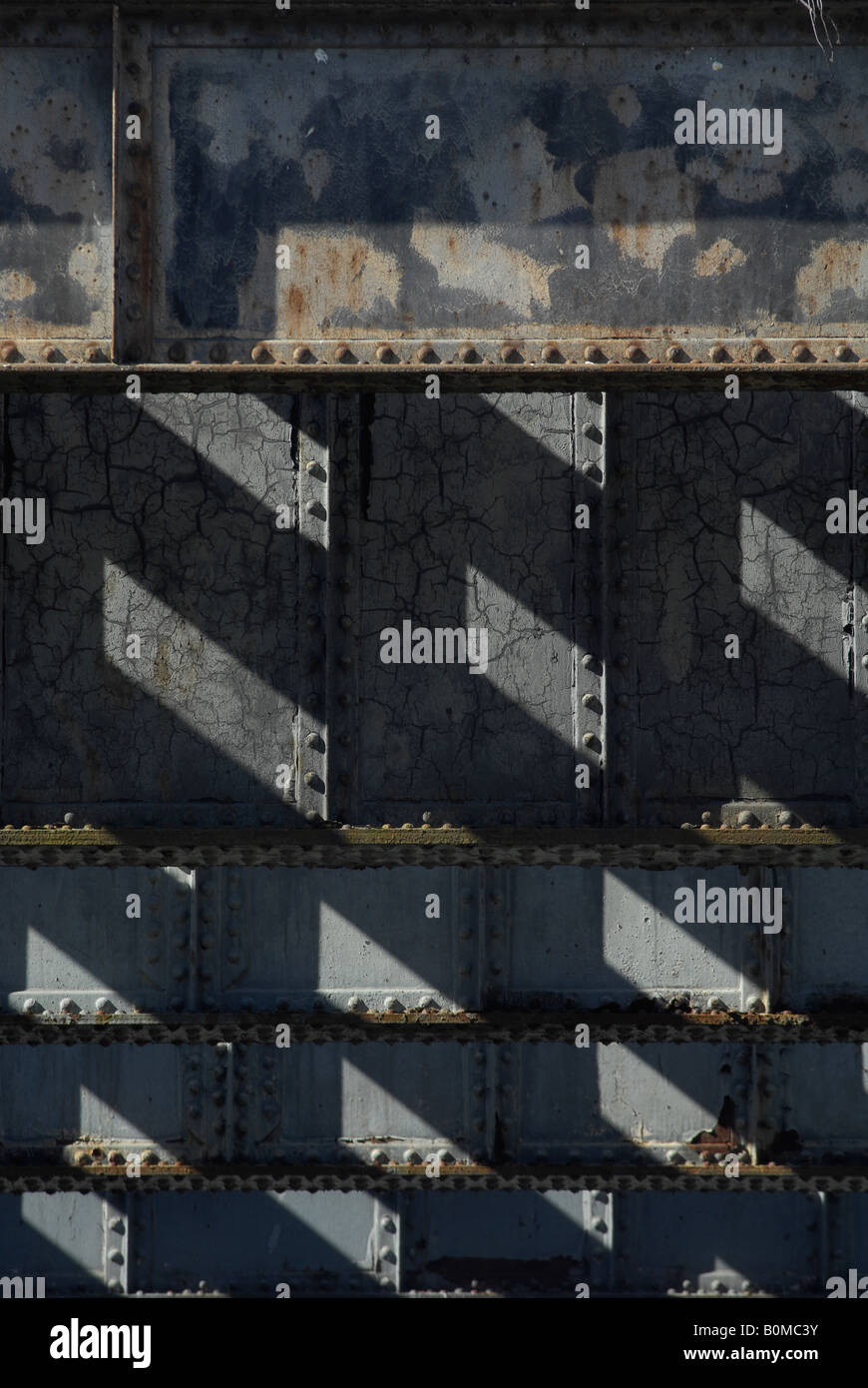 sunlight and shadows on old industrial steel structure Stock Photo