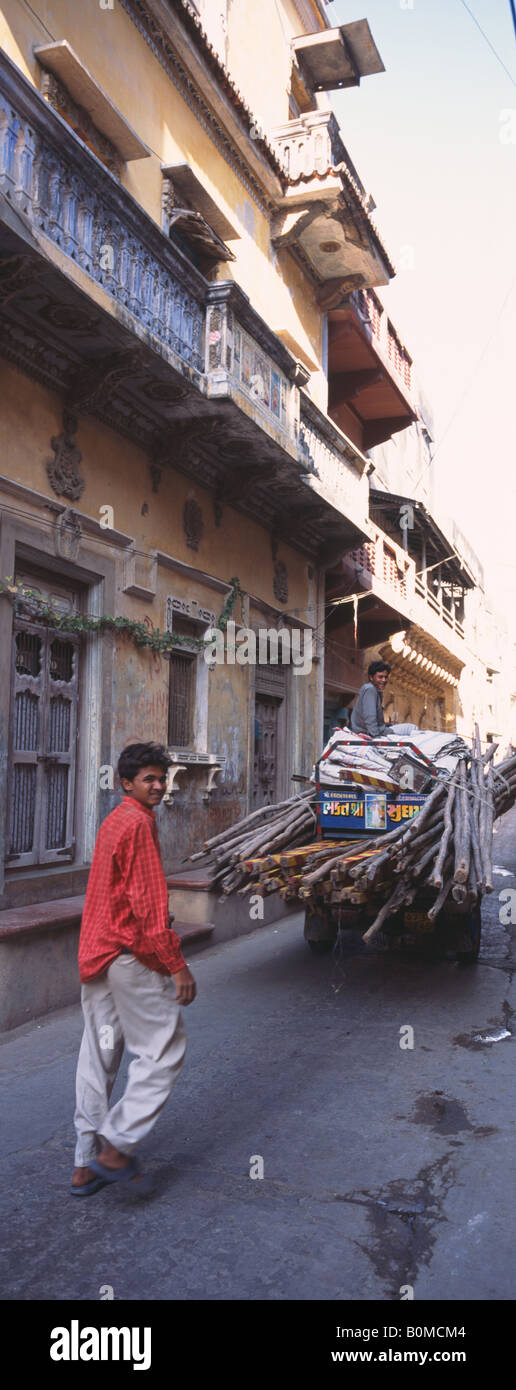 Indian boy pushing cart India panoramic Stock Photo