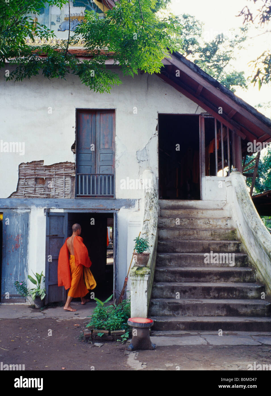 monk in temple house, Laos Stock Photo Alamy