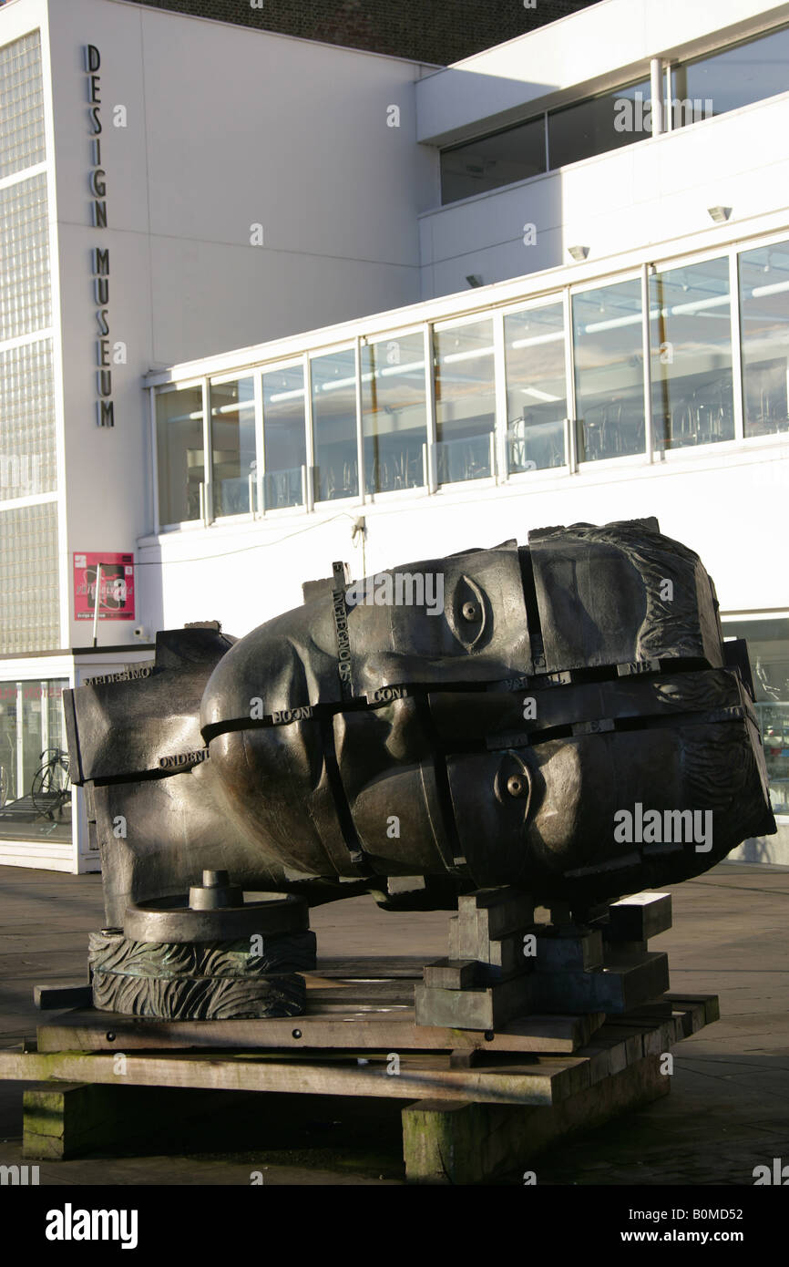 The Invention sculpture by Sir Eduardo Luigi Paolozzi with the Design Museum at Butlers Wharf in the background. Stock Photo