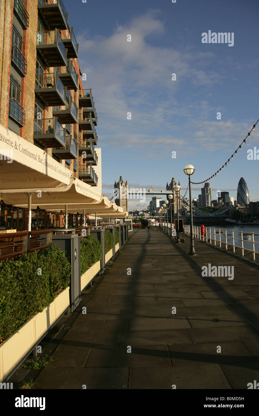 City of London, England. Residential apartments and restaurants at Butlers Wharf on the South Bank of the River Thames. Stock Photo