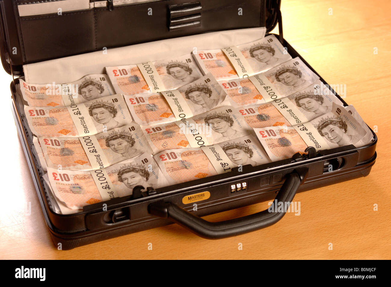 a briefcase full of money Stock Photo Alamy