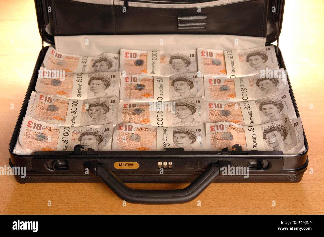 a briefcase full of money Stock Photo Alamy