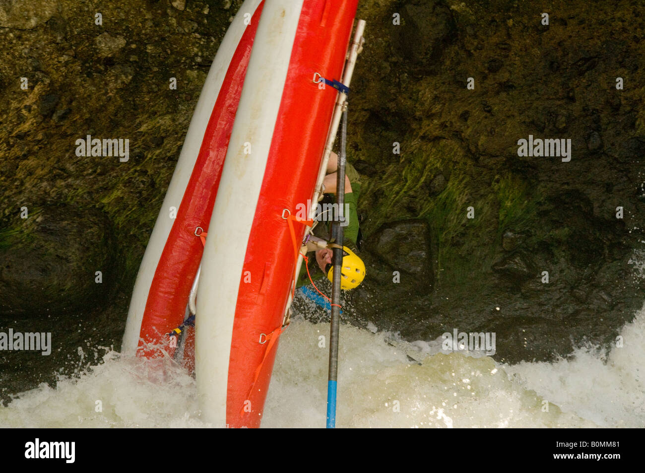 COSTA RICA Rafter flipping cataraft in the churning whitewater of the Reventazon River Caribbean Slope Stock Photo