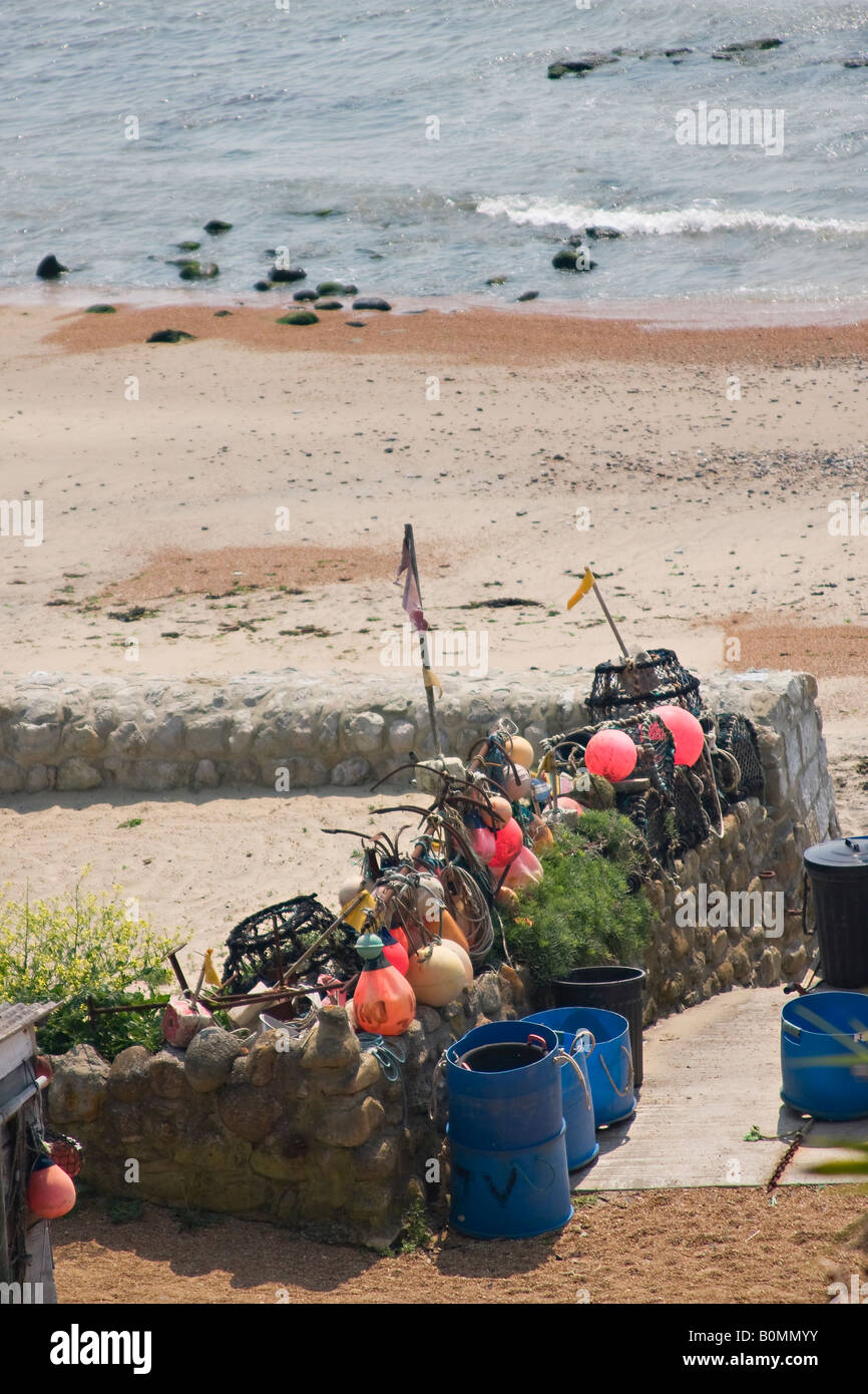 Lobster pots and buoys on the beach at Steephill Cove, Isle of Wight, England, UK Stock Photo