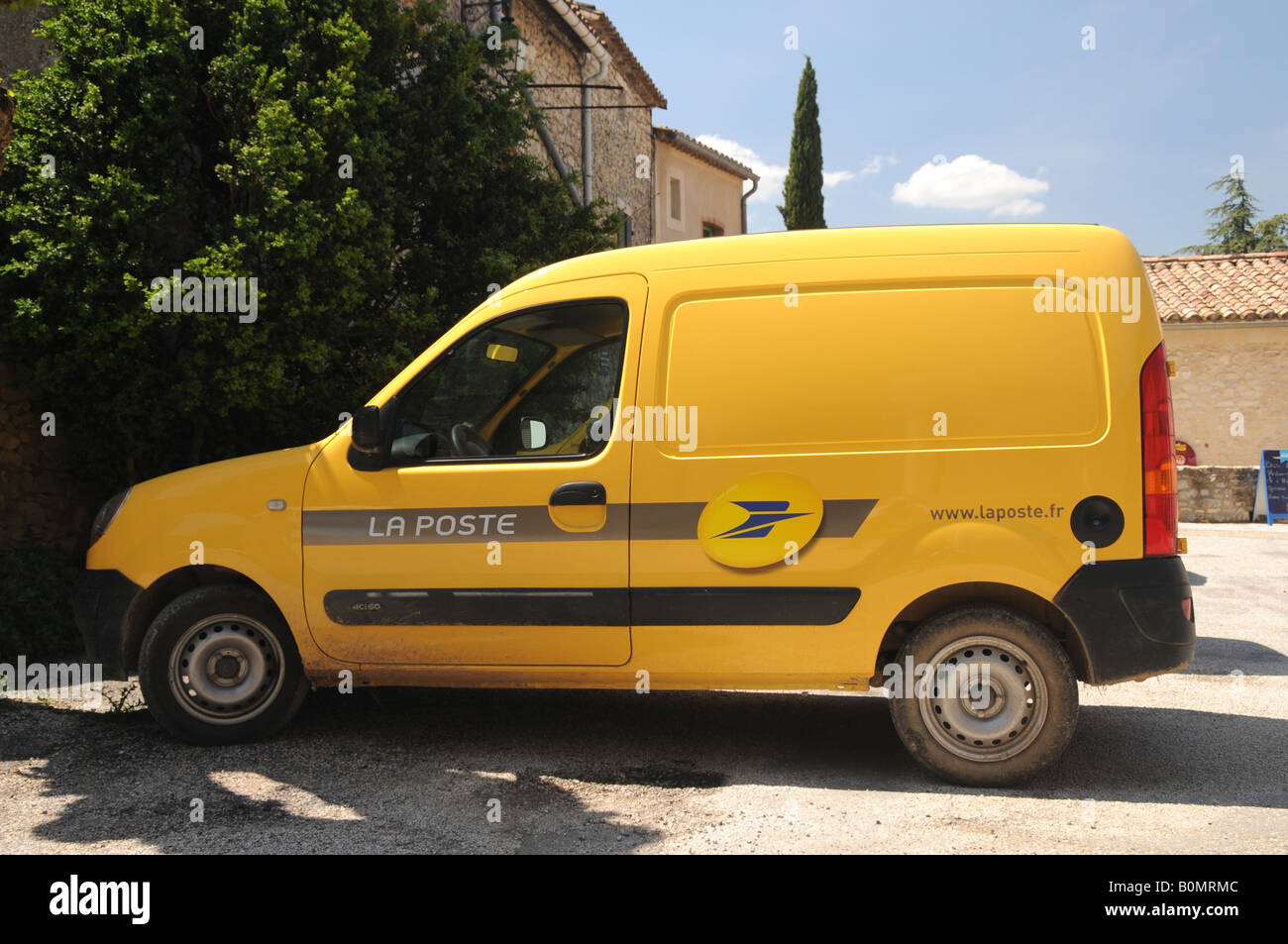 Yellow La Poste delivery van, part of the French postal service Stock Photo  - Alamy