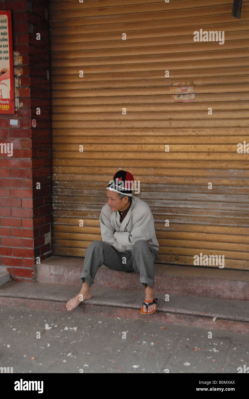 homeless man, living rough on the streets off bangkok Stock Photo