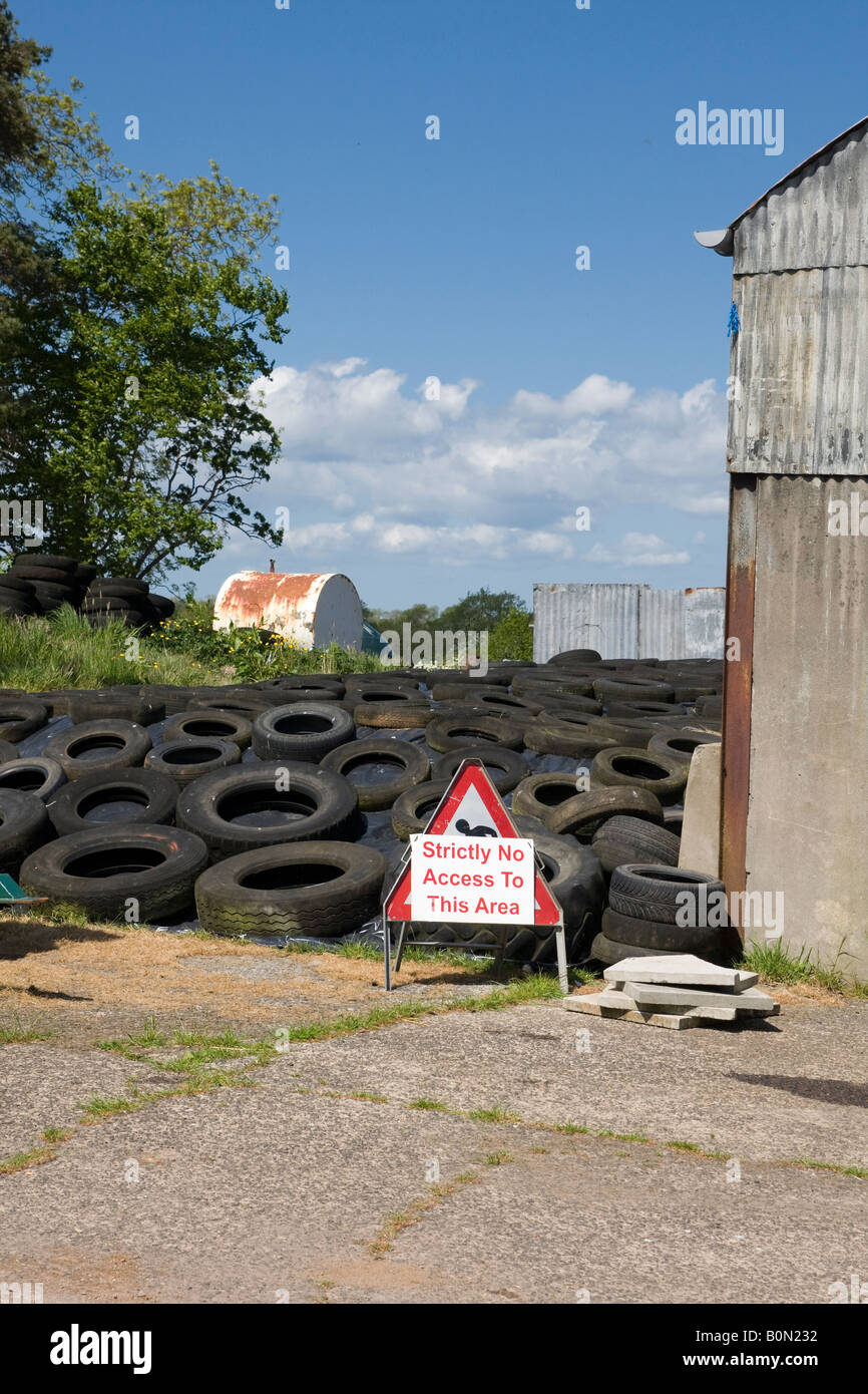 Warning sign at a silage pit on a small farm Stock Photo