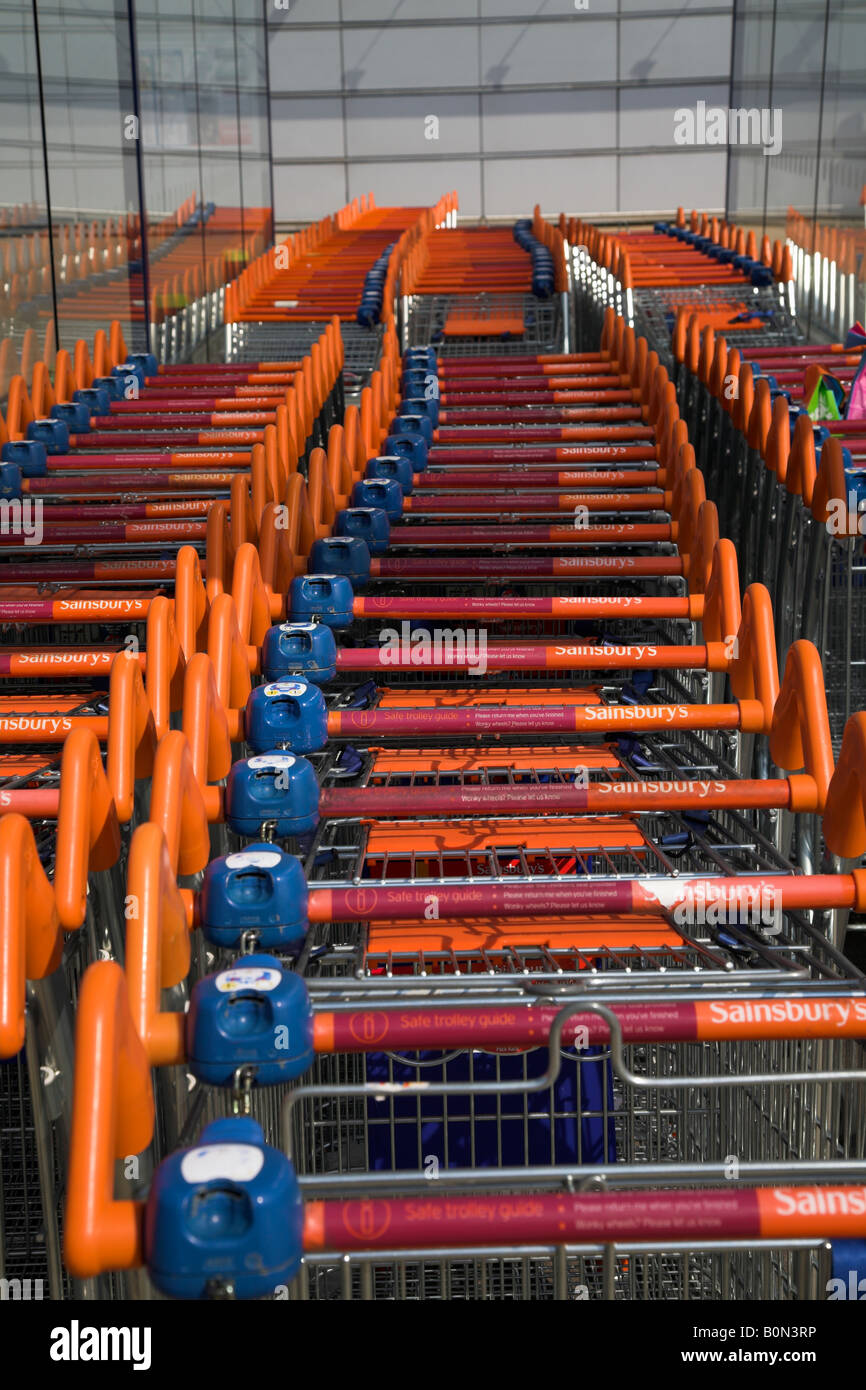 Row sainsburys supermarket trolleys hires stock photography and images