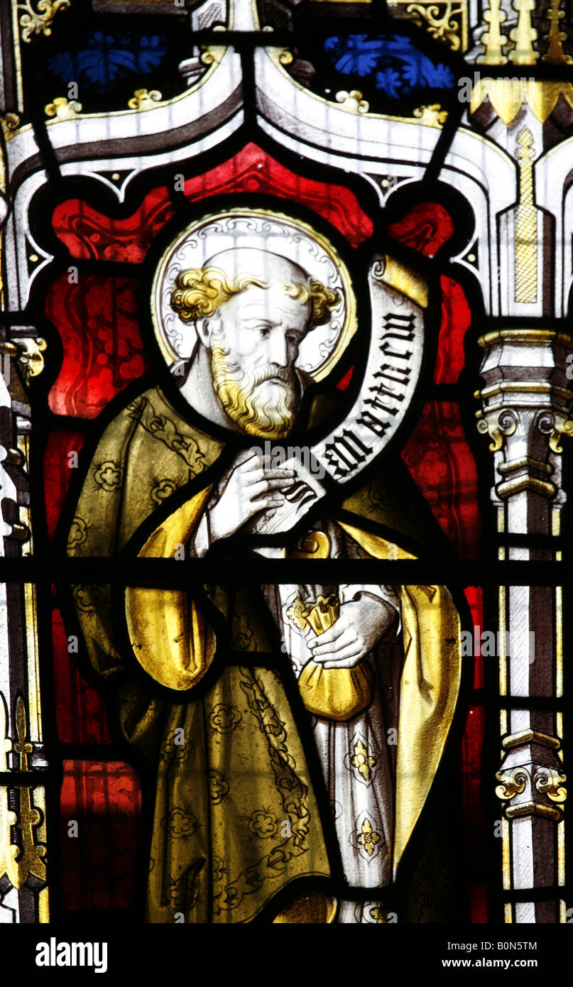 Stained Glass Window Depicting Saint Matthew St Fabian St Sebastian Church Woodbastwick Norfolk Stock Photo