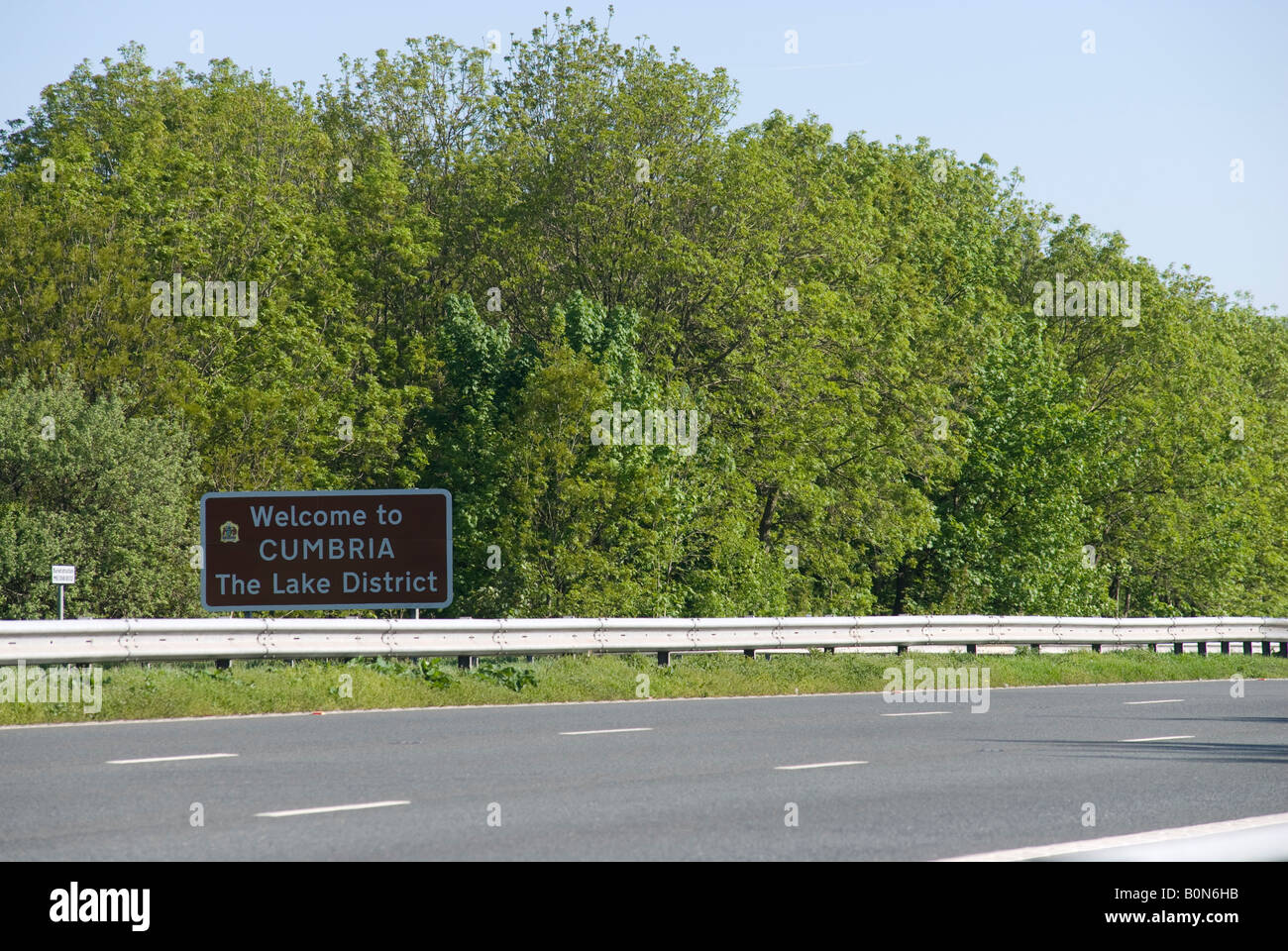 welcome to cumbria the lake district motorway sign Stock Photo - Alamy