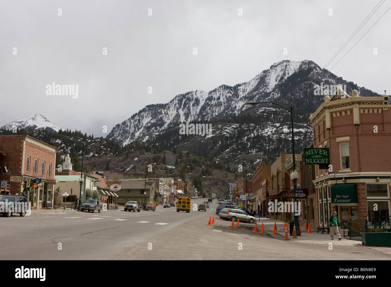 Shops line Main Street San Juan Skyway in Ouray Colorado small town nestled in the mountains nicknamed 'Switzerland of America' Stock Photo