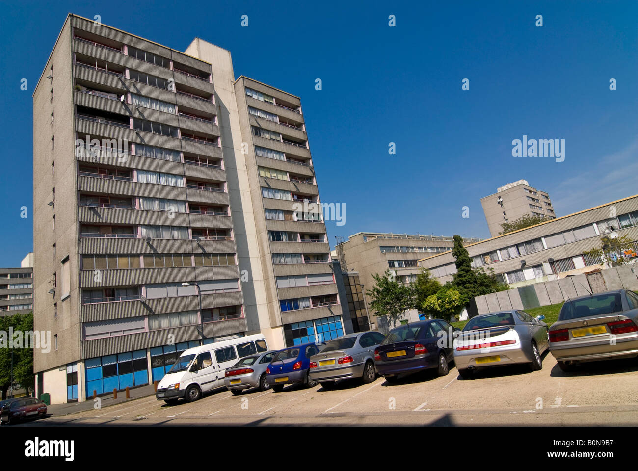 Horizontal wide angle of Wixom House one of the tower blocks comprising the Ferrier Estate in Kidbrooke Park on a sunny day Stock Photo