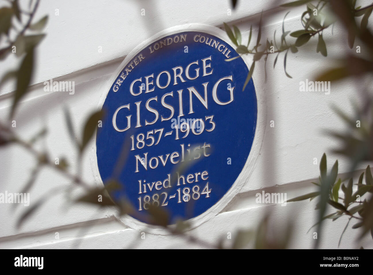 greater london council blue plaque marking a former home of novelist george gissing, in oakley gardens, chelsea , london Stock Photo