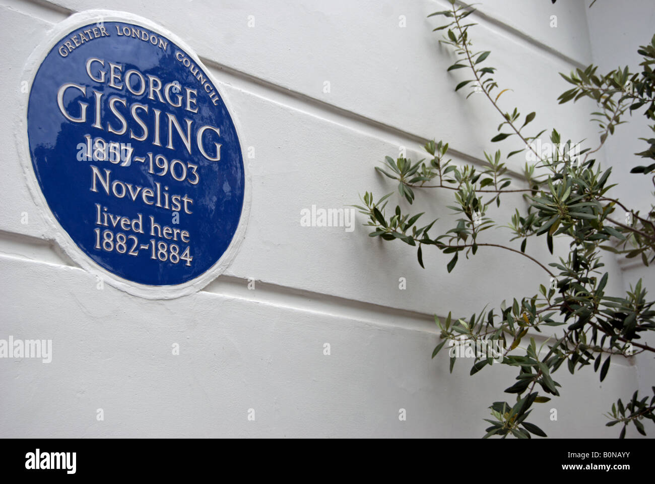 greater london council blue plaque marking a former home of novelist george gissing, in oakley gardens, chelsea , london Stock Photo
