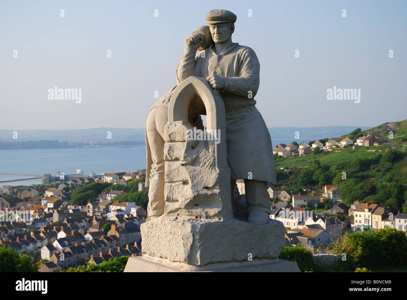 'Spirit of Portland' Statue with Fortuneswell town behind, Isle of Portland, Dorset, England, United Kingdom Stock Photo