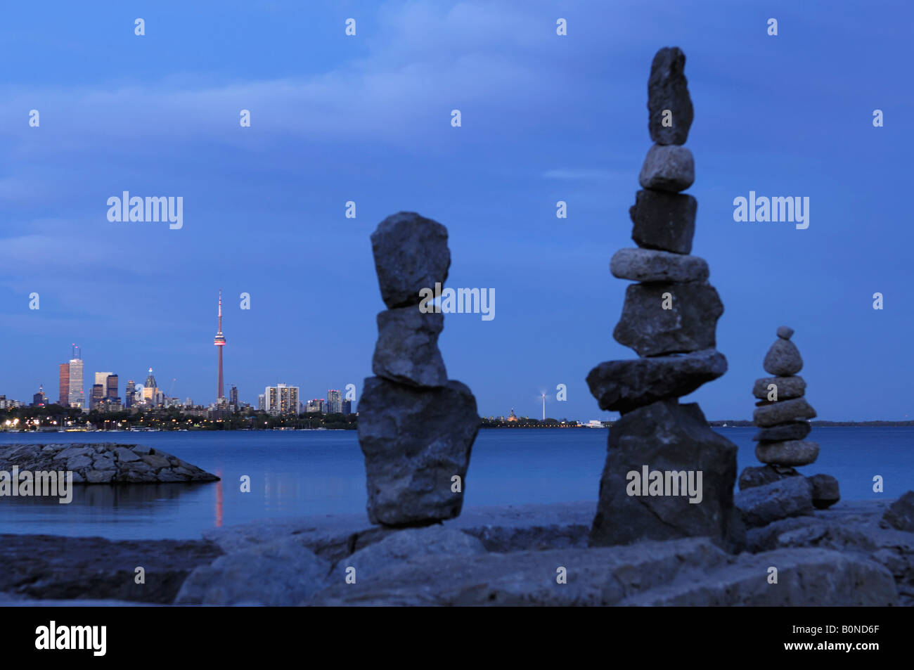 Stone human figures and Toronto Cityscape Stock Photo