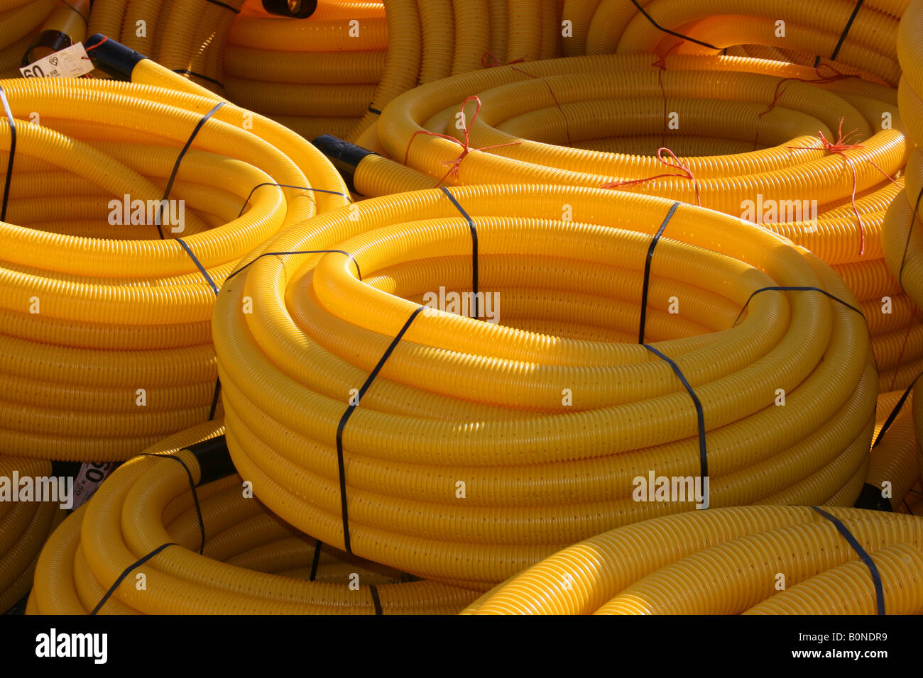 rolls of corrugated drainage pipe Stock Photo Alamy
