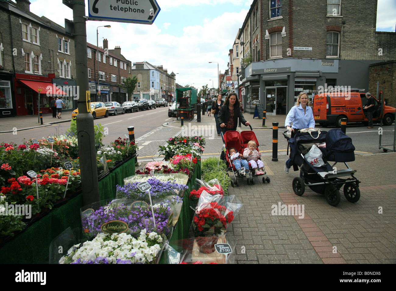 Mothers pushing their babys Northcote Road Stock Photo