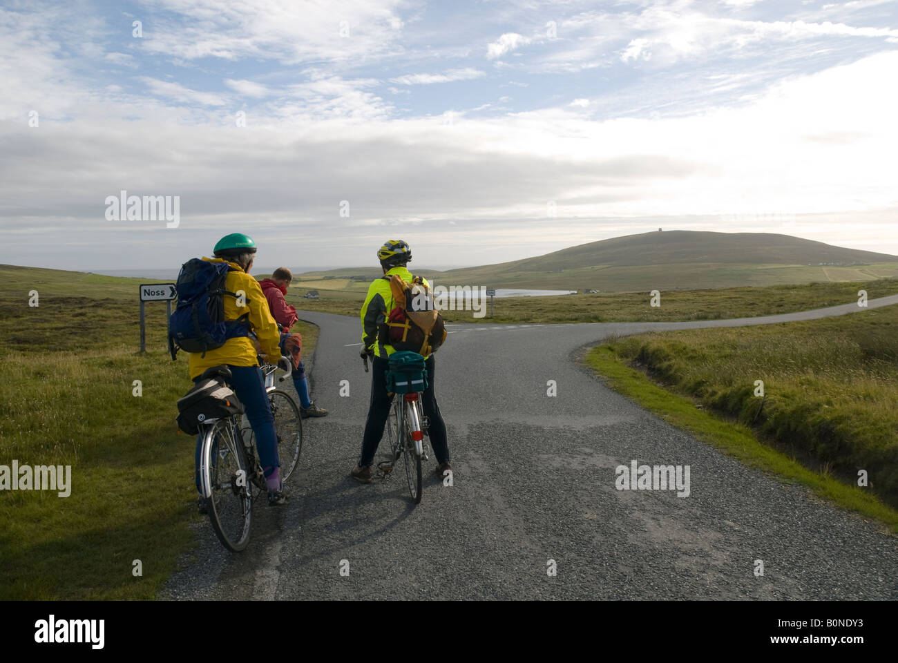 Cyclists on a road on Bressay Island, Shetland Islands, Scotland, UK Stock Photo