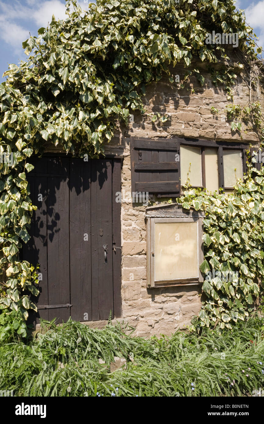 Hope Bowdler Shropshire England UK Quaint old outbuilding detail with ivy covered wall and