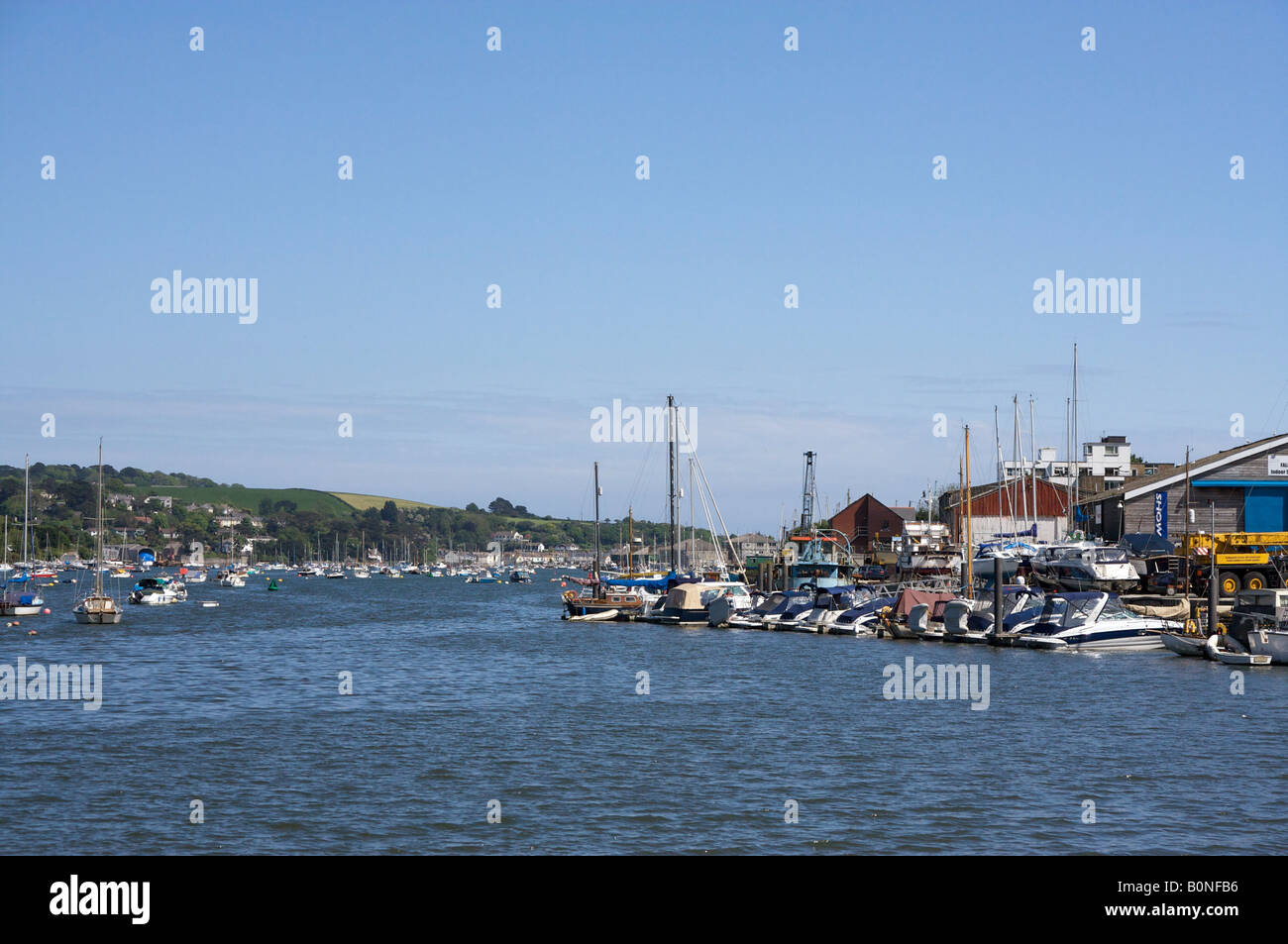 Boats on moorings on the RIver Fal and at the Penryn Marina Stock Photo