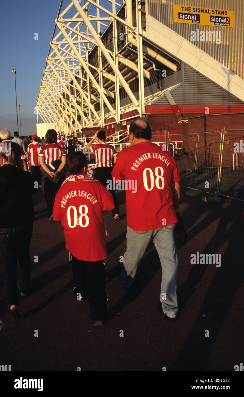 Father And Son Attending Stoke City Match In Stoke-on-Trent Stock Photo
