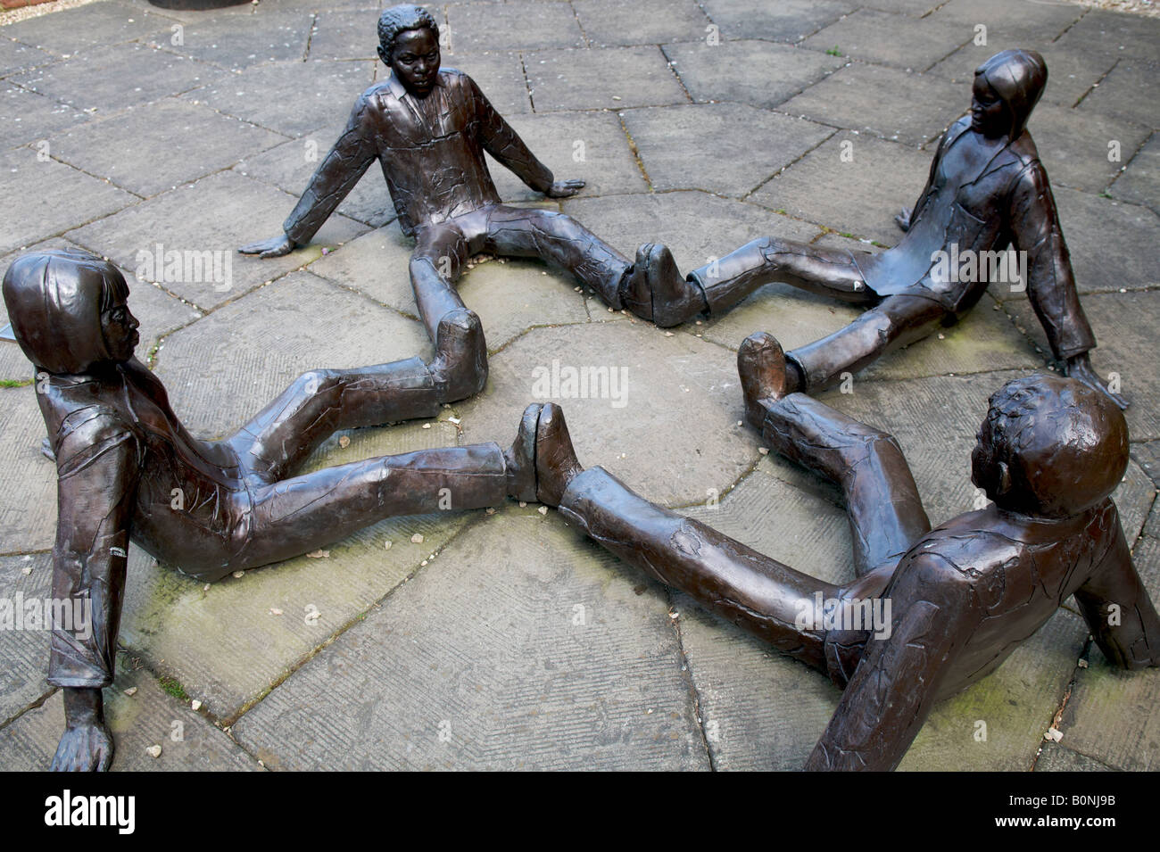 Touching Souls sculpture in the grounds of Tewkesbury Abbey Stock Photo
