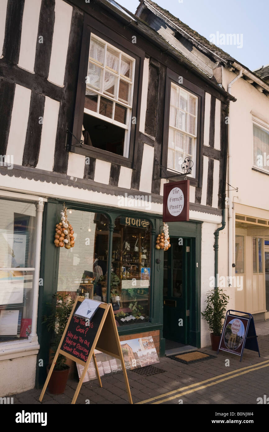 Ludlow Shropshire England UK Grocery shop selling French food in old timber framed building Front window and door Stock Photo