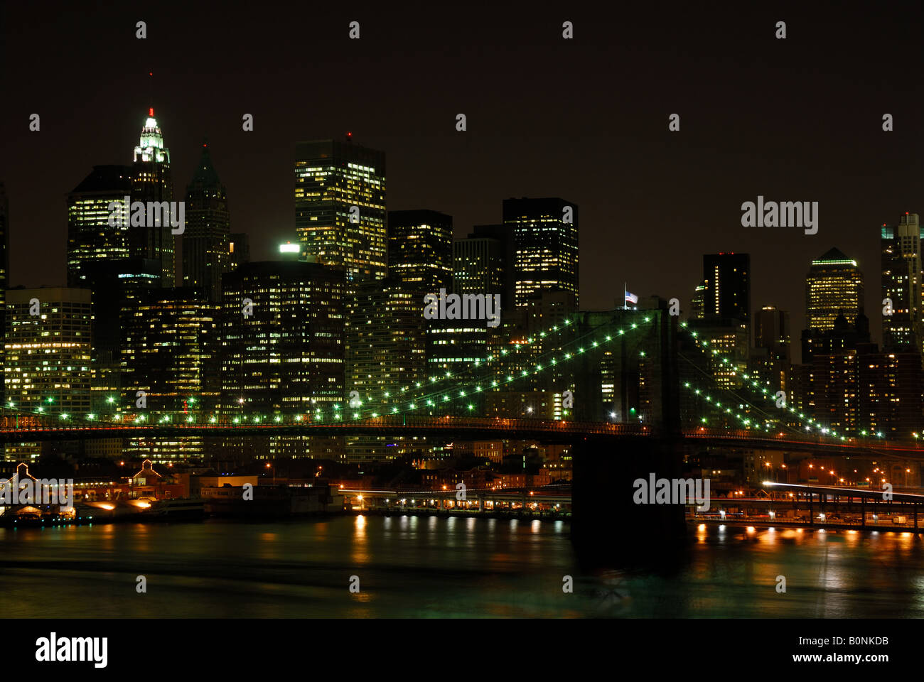 Lower manhattan skyline night waterfront hi-res stock photography and ...