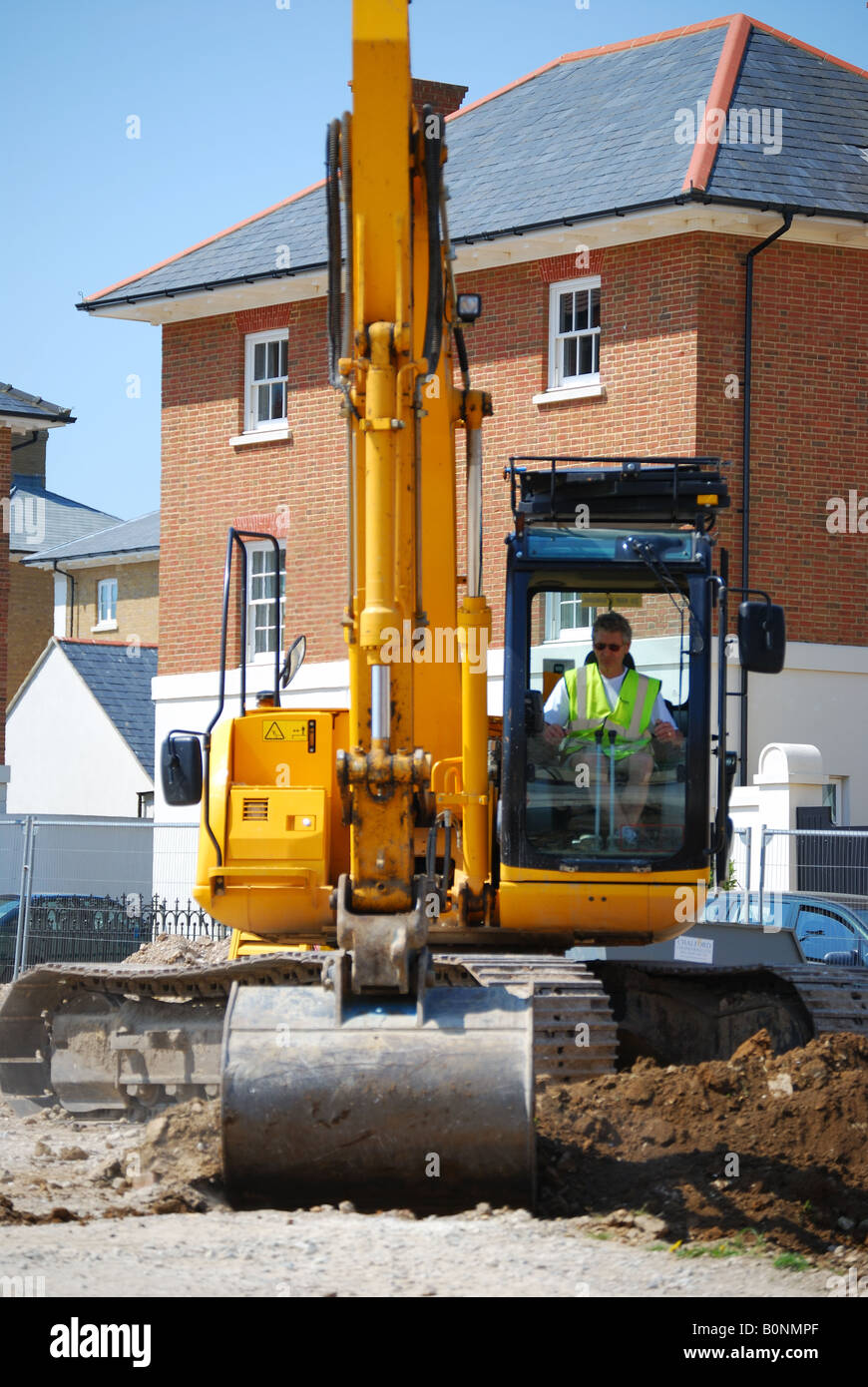 Earthmoving equipment on new housing development, Poundbury, Dorchester, Dorset, England, United Kingdom Stock Photo
