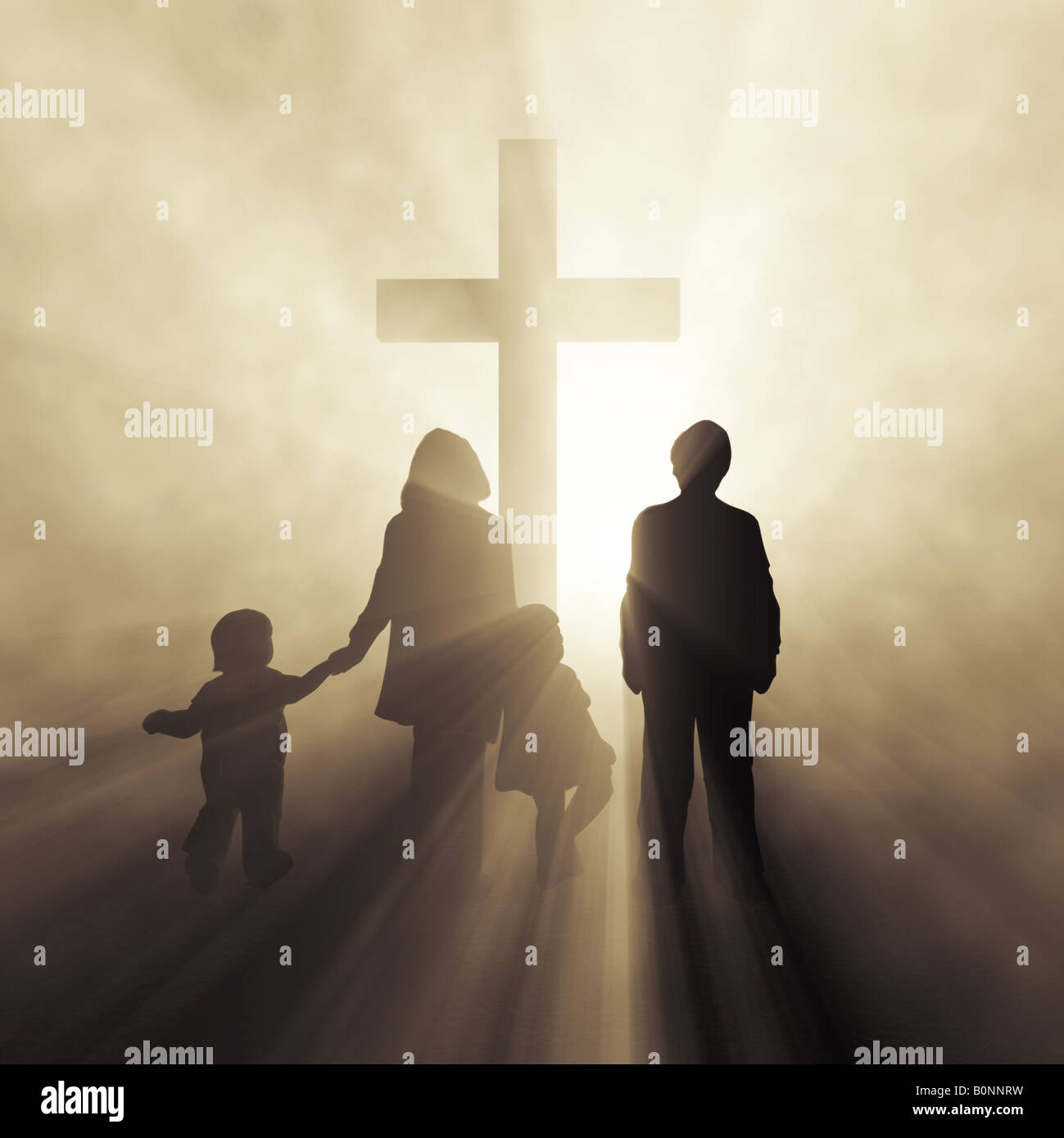 Christian family prayer before cross Stock Photo