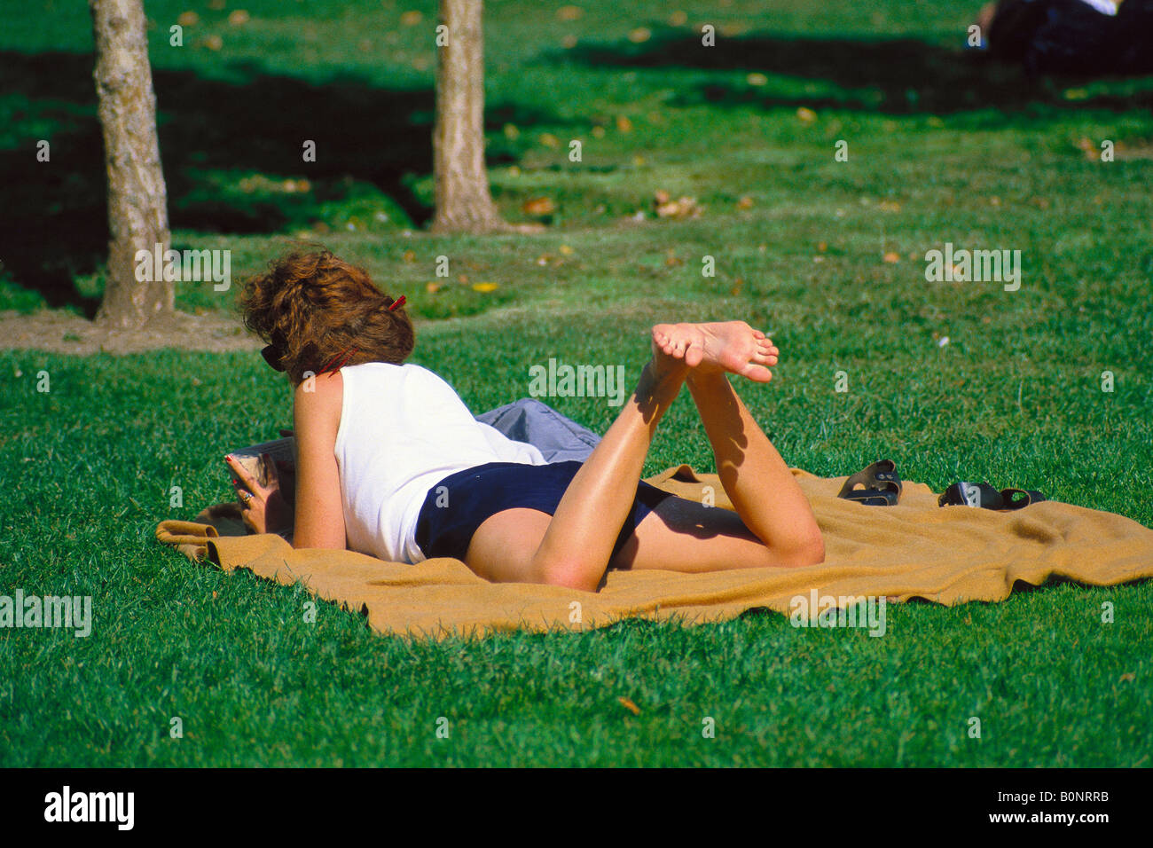 Sun bath San Francisco park Stock Photo - Alamy
